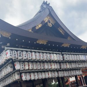Lanterns line the sides of a shrine in Gion