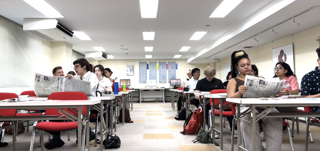 students await a presentation at the Kyoto Shimbun