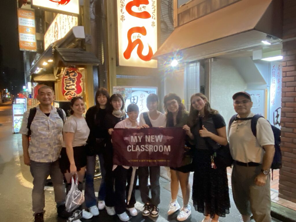 Volleyball students from Chuo Gakuin University and their professor, Toshi Ogura, joined SJMC Japan Team members for dinner in Akihabara. Pictured from left to right are Toshi Ogura, Jamie Gonzalez, Rena, Miki, Rin, Aoba, Gabby Fiorenza, Brianna Archer and Gilbert D. Martinez.