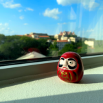 Daruma Doll placed on my windowsil